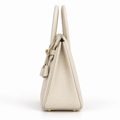 Side profile of the MIXIO ÉCRU bag, showing the gusset and rolled handles.